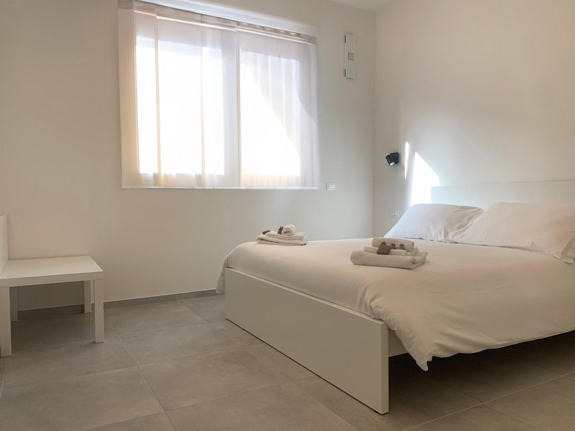 Green Home - Bellagio Apt โกโม ภายนอก รูปภาพ